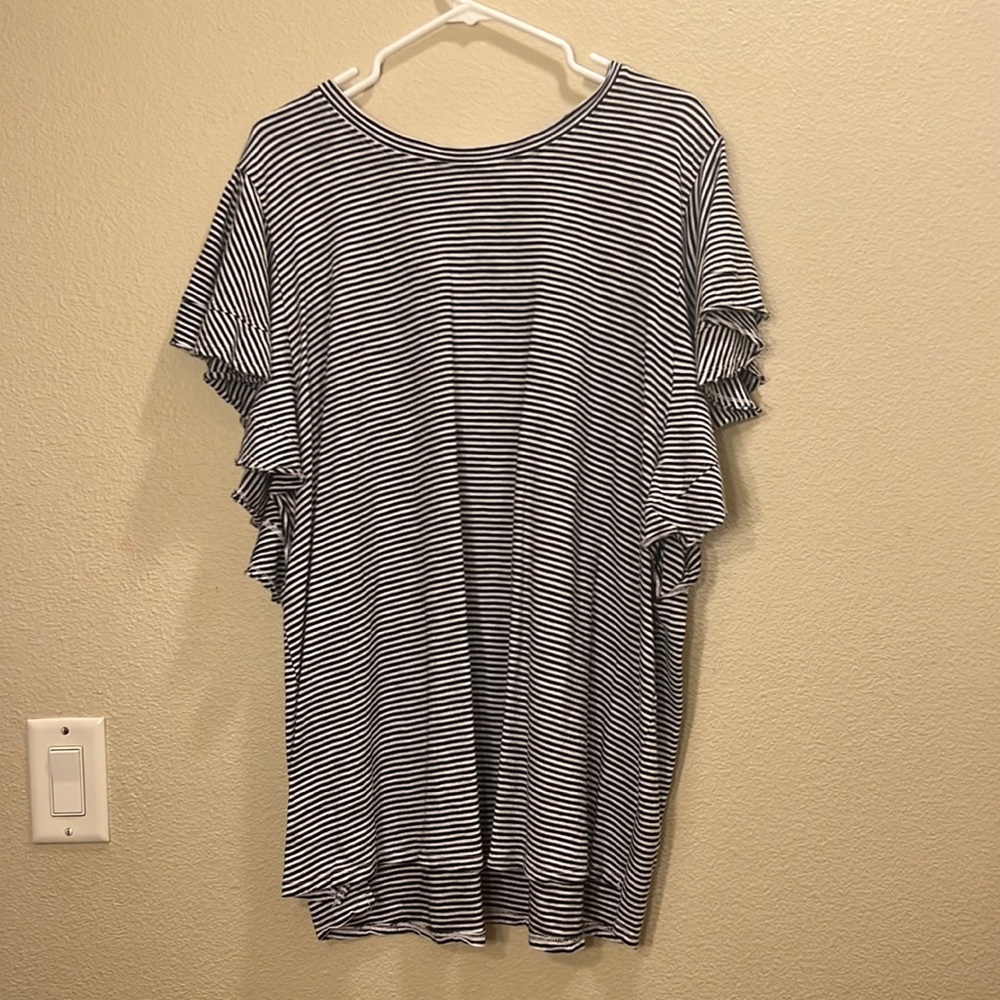 Selling a plus size 2x black & white striped blouse
